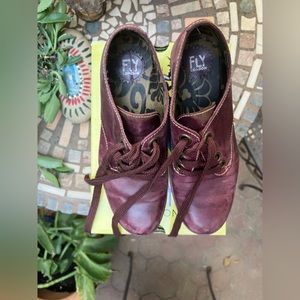 Distressed purple leather platform lace up shoes from Fly London